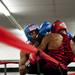 Arkeem Kirk and Boney Hines on the ropes during the A-Square Fight Club Boxing Showcase on Friday, July 19. Daniel Brenner I AnnArbor.com